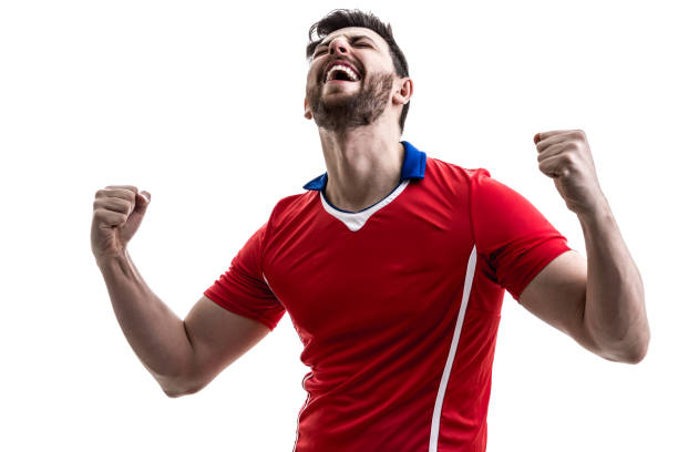 istock Fan / Sport Player on red uniform celebrating on white background 929308178