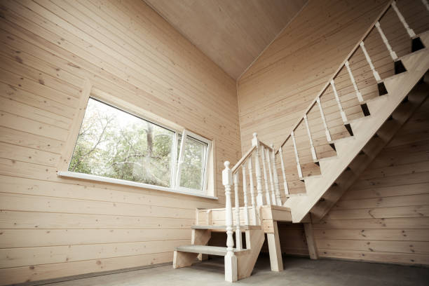 istock Empty room interior with wooden stairway 929320602