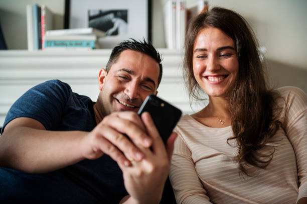 istock Couple relaxing at home 929345738