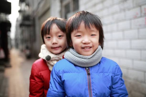 Cute asia children in the hutong