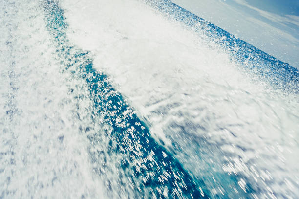 istock High-speed motorboat wake trails and spray Phang Nga Bay 929354136