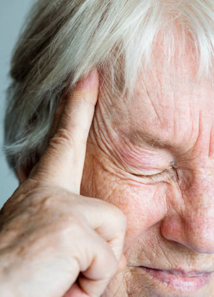 istock Elderly woman suffering from migraine 929360674