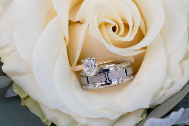 istock Wedding Rings on Bridal Bouquet 929360698