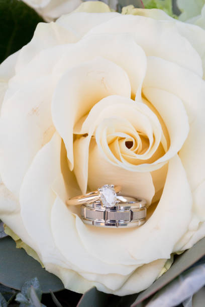 istock Wedding Rings on Bridal Bouquet 929360846
