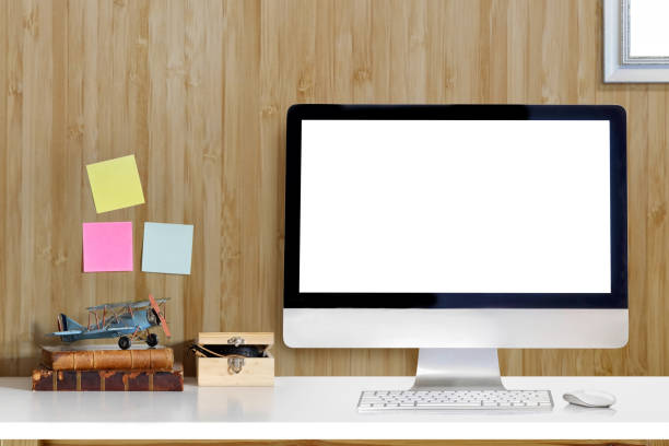 istock Mock up of creative desktop desktop computer, vintage toy, old books. designer workspace. 929365568