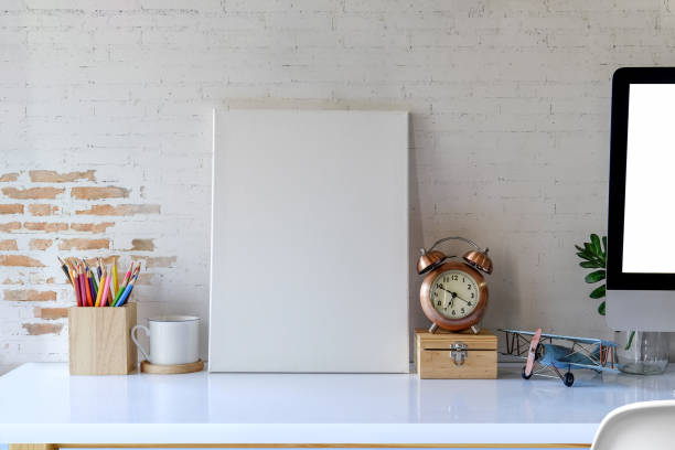 istock Mock up poster frame in hipster desk space background 929368280