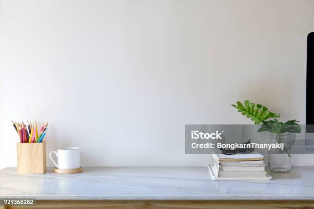 Contemporary Workspace With Books Colour Pencils Gadgets And Supplies Workspace And Copy Space Stock Photo - Download Image Now