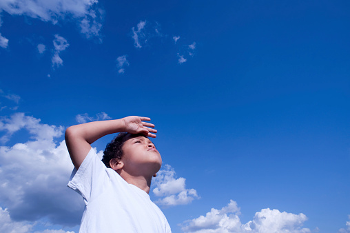 Little Boy looks ahead.