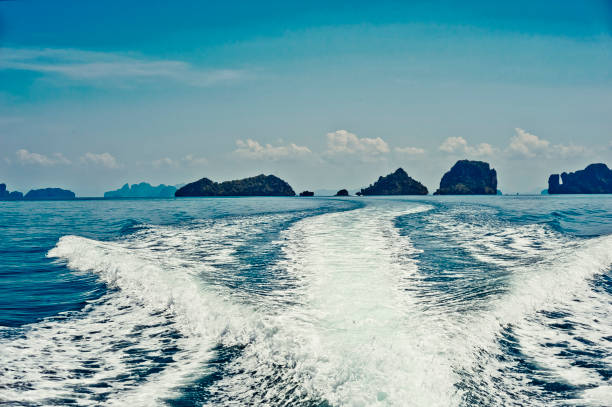 istock High-speed motorboat wake trails and Phang Nga Bay 929435506