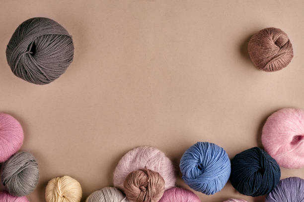 istock Set of colorful wool yarn on beige background. Top view 929448106