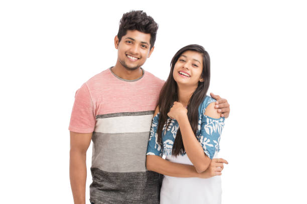 istock Beautiful happy young couple looking at the camera 929448758