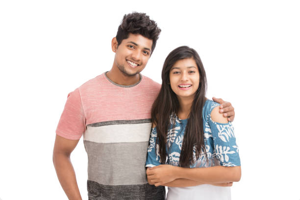 istock Beautiful happy young couple looking at the camera 929448792