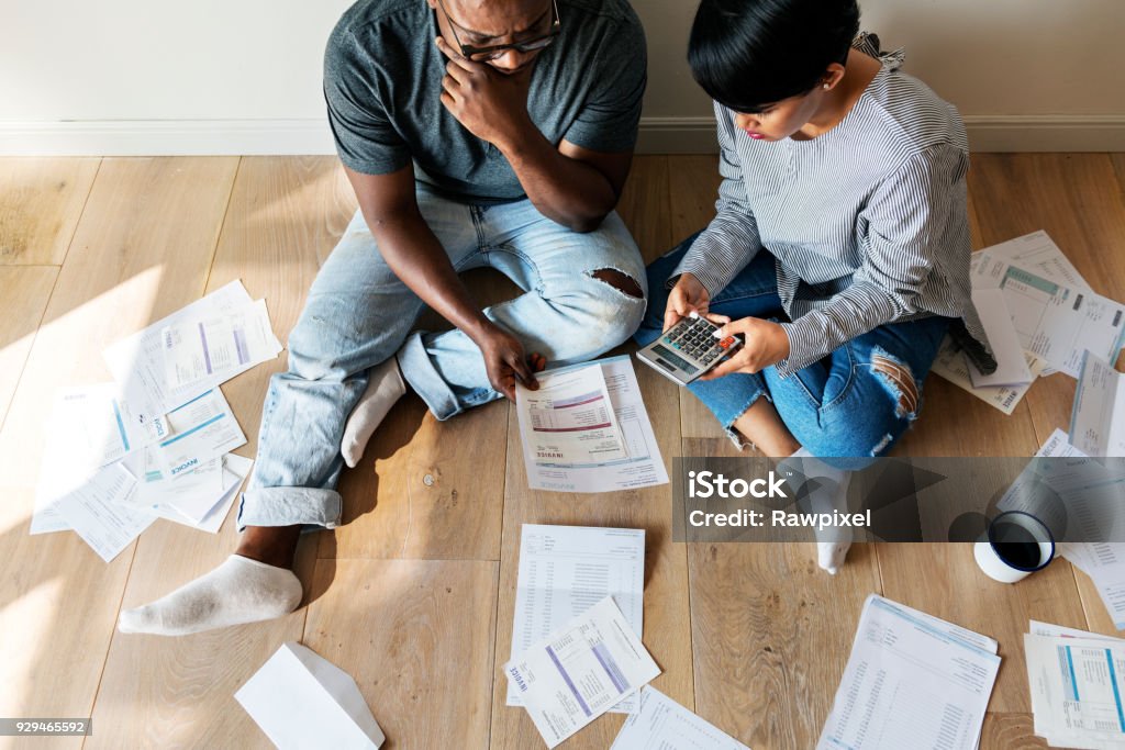 Couple managing the debt Finance Stock Photo