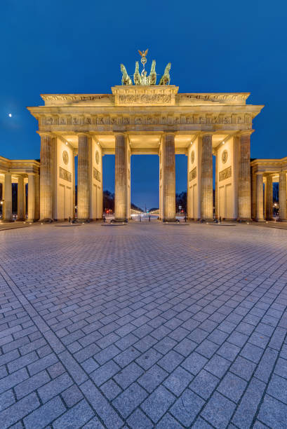 istock The famous illuminated Brandenburg Gate in Berlin 929473102