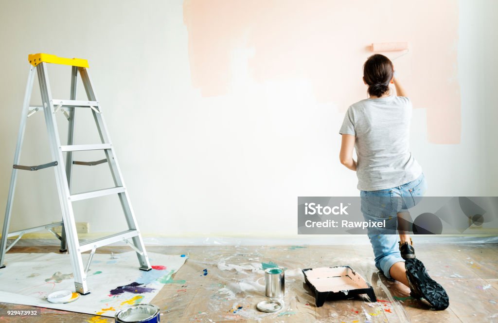 People renovating the house Painting - Activity Stock Photo