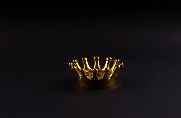 Gold jeweled crown on velvet