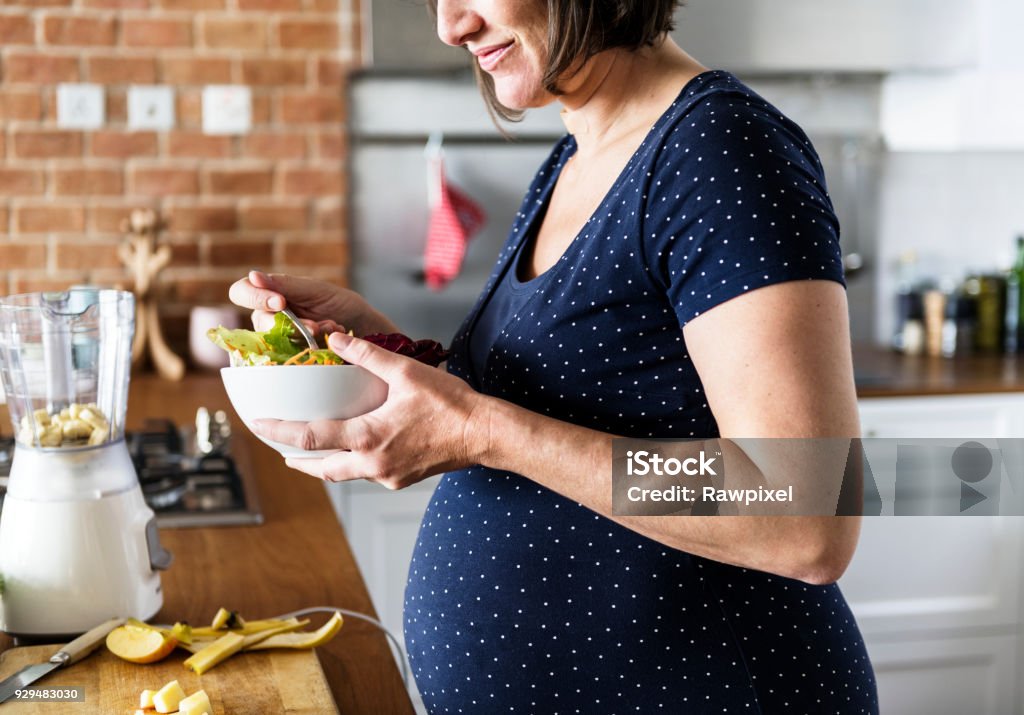 Pregnant woman eat healthy food Pregnant Stock Photo
