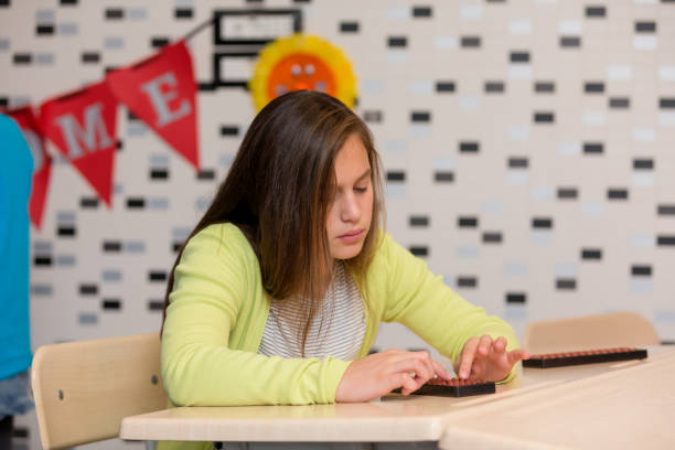 istock Schoolgirl in with abacus 929494934