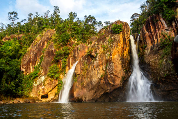 istock Waterfall and cliff beautiful with sunshine at Chat Trakan 929498202