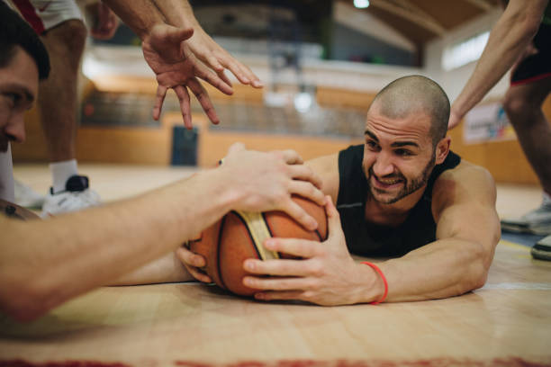 istock Fighting for a ball on basketball match! 929499072