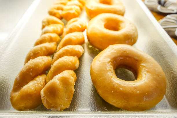 istock Donuts ring and spiral placed on a glass tray 929502208