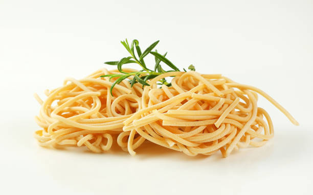 istock bundles of spaghetti pasta 929503396