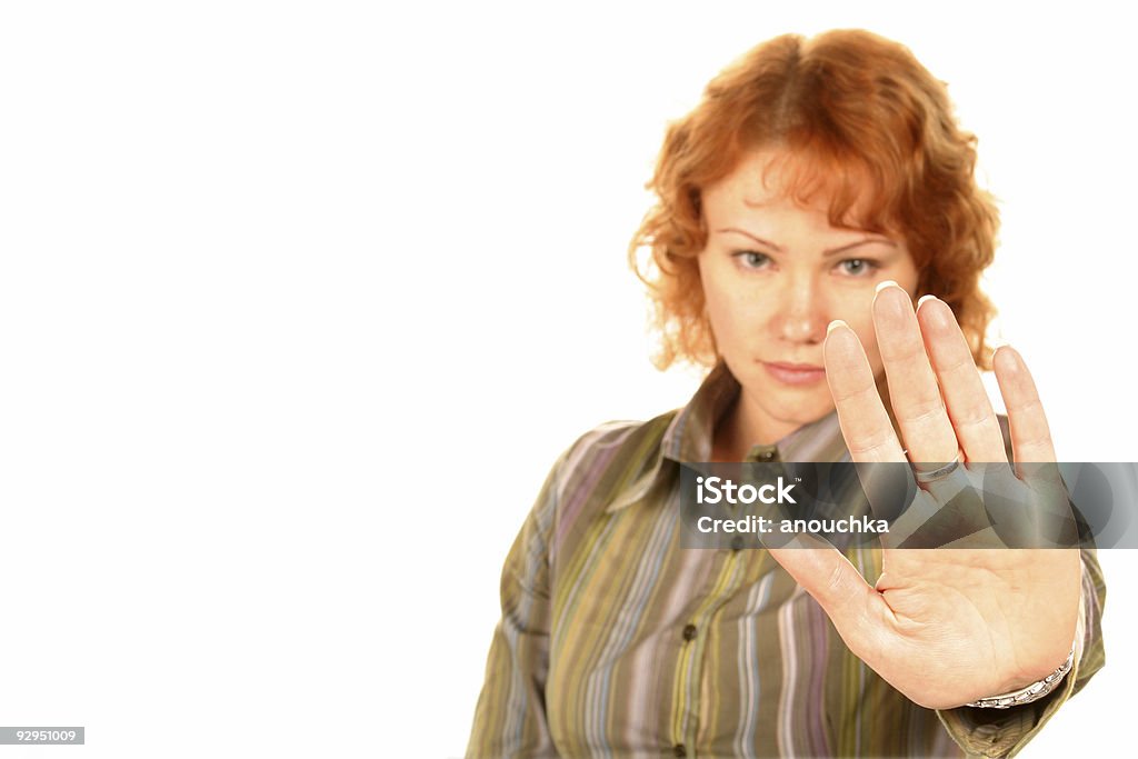 STOP (focus on hand) doing STOP sign , isolated, white background, copyspace (focus on hand) 20-24 Years Stock Photo