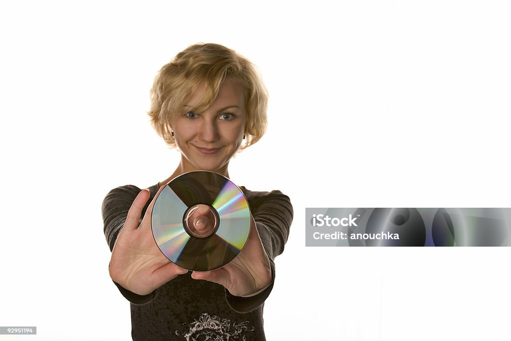 Linda menina com um CD ou DVD de desconto - Foto de stock de 20 Anos royalty-free