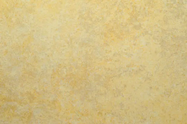 Porcelain stoneware tile texture or pattern. Natural stone beige color with veining. Ceramic tile texture