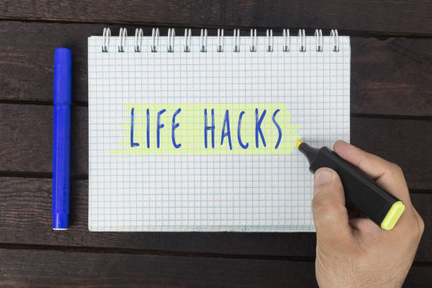 hand writing on notepad: Life hacks Human hand writing on notepad: Life hacks. lifehack stock pictures, royalty-free photos & images