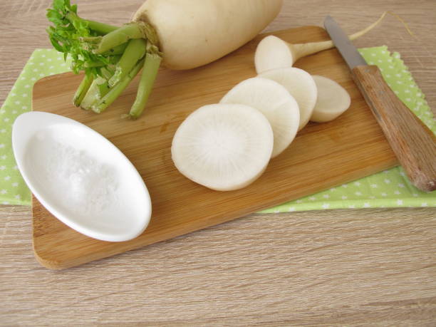 istock White daikon radish with salt 929524424