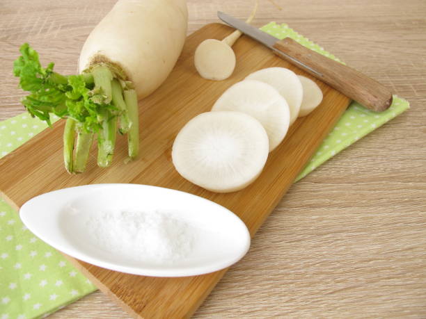 istock White daikon radish with salt 929524426