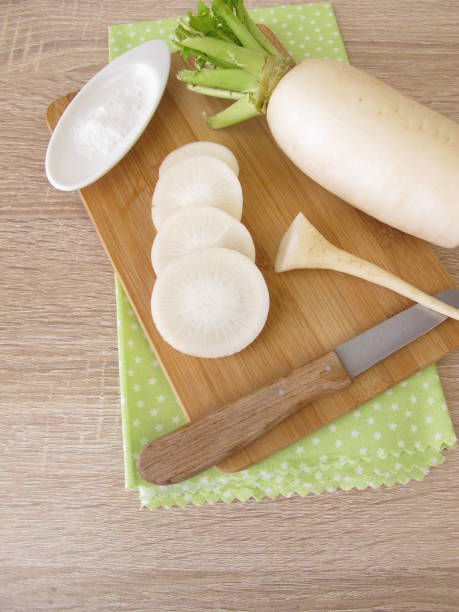 istock White daikon radish with salt 929524438