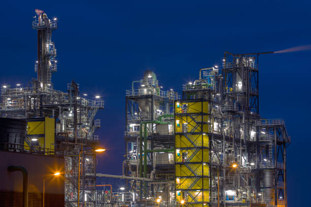 istock Oil Refinery at Night 929525534