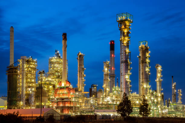 istock Oil Refinery at Night 929526242
