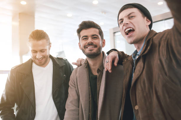 istock Glad friends expessing positive emotions 929530256