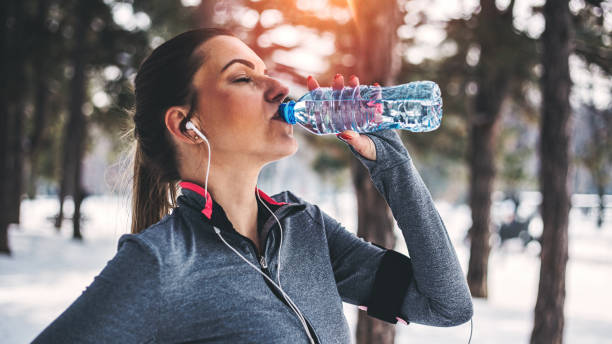 istock Fitness woman drinking water 929549262