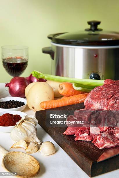 Preparing A Casserole Stock Photo - Download Image Now - Crock Pot, Beef Stew, Ingredient