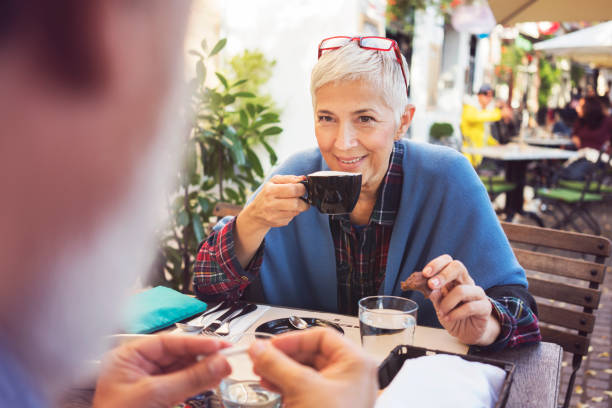 istock Mature woman at restaurant on lunch 929555648