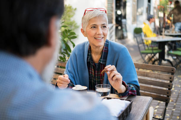 istock Mature woman at restaurant on lunch 929555848