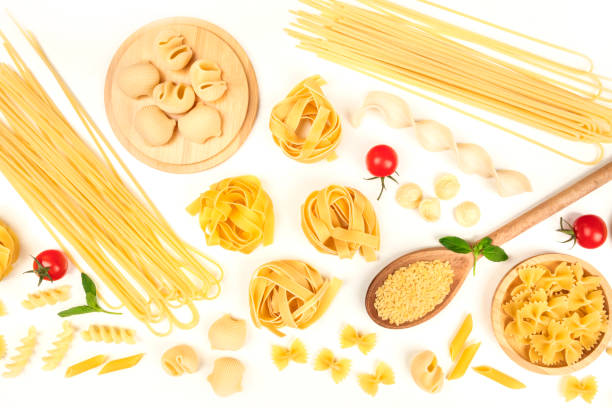 istock Overhead photo of different types of pasta on white 929555896