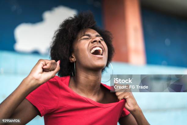 African Fan Watching A Soccer Game Stock Photo - Download Image Now - Shouting, Fan - Enthusiast, Sport