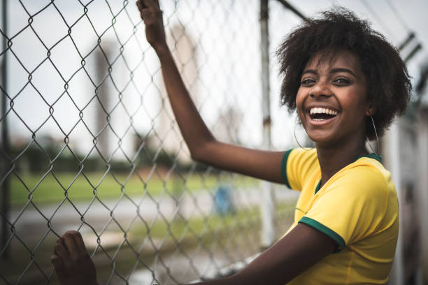 istock Brazilian fan watching a soccer game 929569158