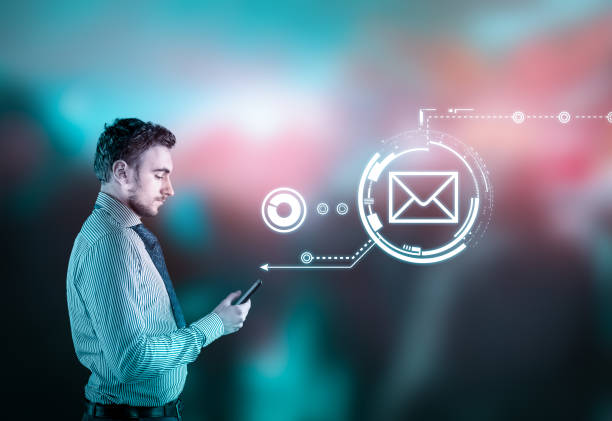istock Businessman using smarphone on abstract background with bokeh lights. 929578778