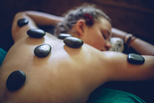 istock Girl relaxing with lastone therapy 929579010
