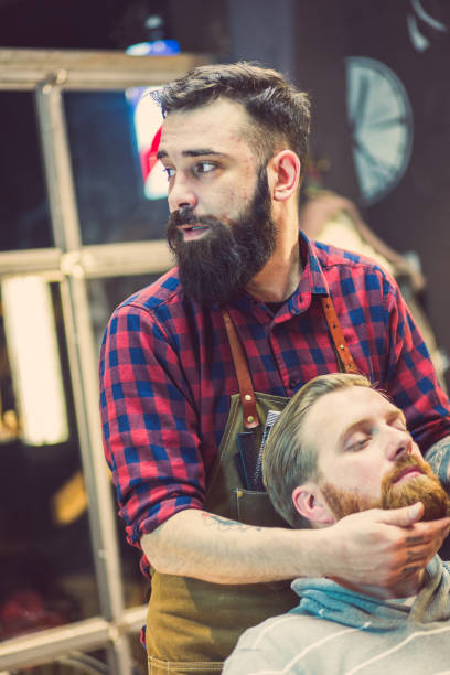istock Ginger, bearded guy at the barber shop 929581758