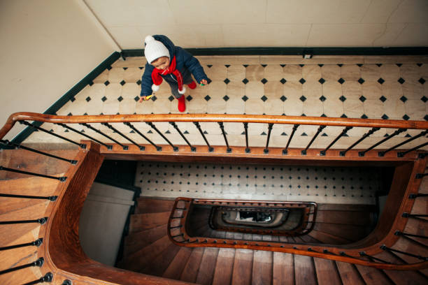 istock Child walking on staircase in Paris 929591382