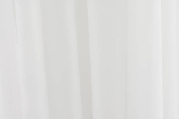 istock White fabric texture background. Crumpled of curtains material. 929595530