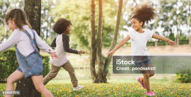 Little Girl Playing With Friend Stock Photo - Download Image Now - Child, Playful, Playing