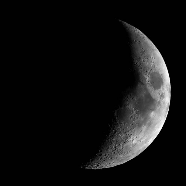 istock High contrast Waxing crescent moon seen with telescope 929597986